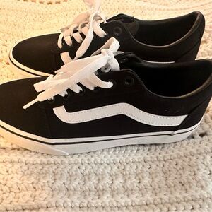 Vans Black and White Athletic Shoes with Iconic Design